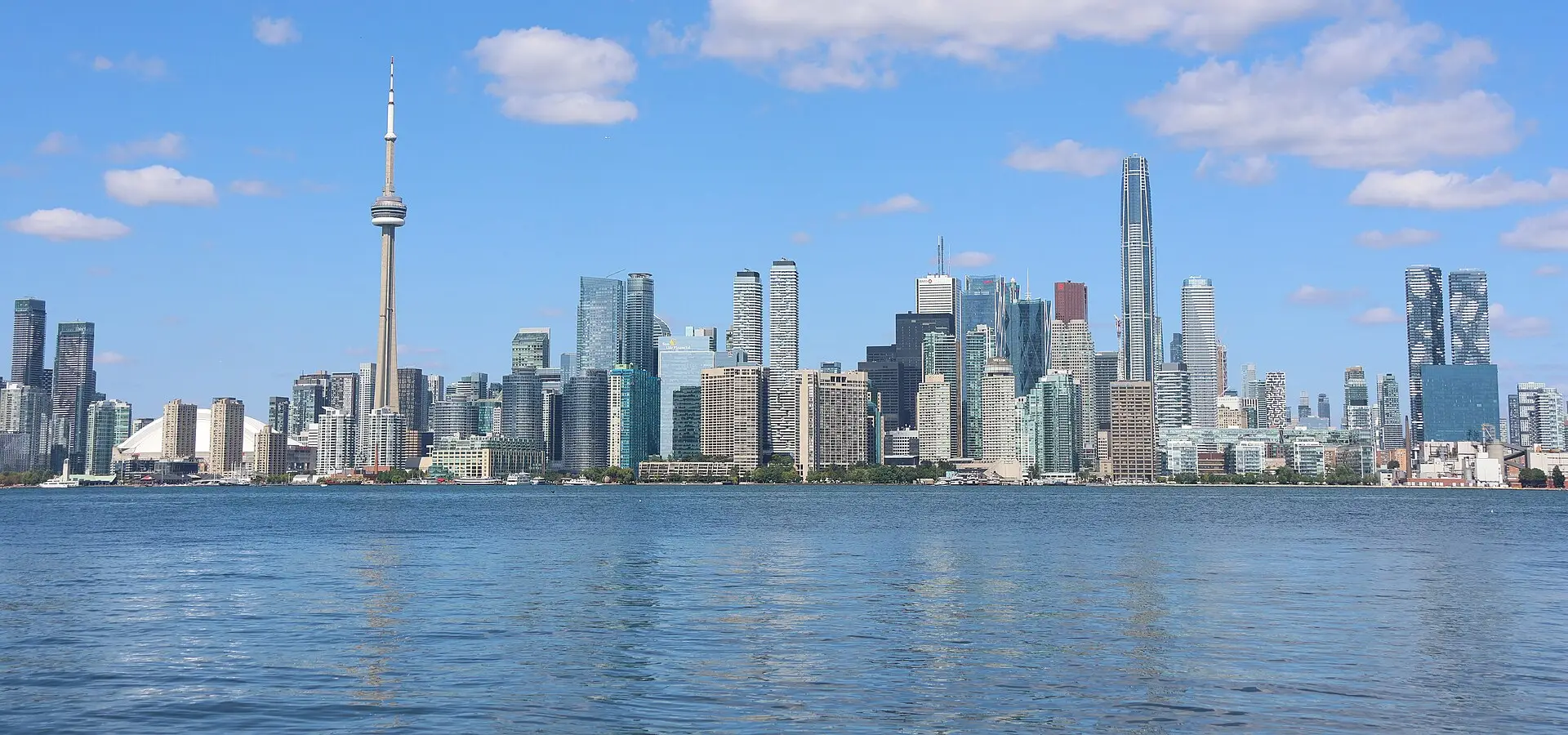 The downtown Toronto skyline and the CN Tower seen across the harbour from Snake Island on a clear September day.